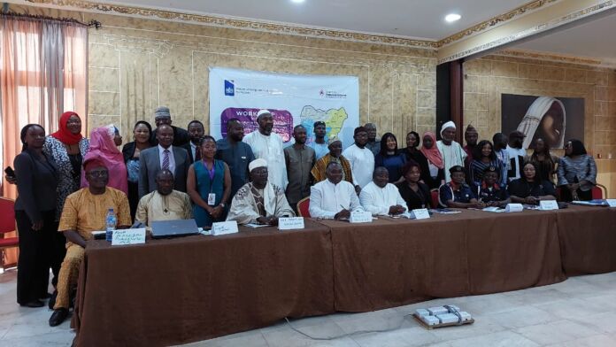 Photo : Acting Country Director, Search for Common Ground, Fatima Madaki alongside participants, religious actors, civil society representatives, security and government agencies during a two-day workshop for Promoting and Protecting Freedom of Religion Delief in Abuja-Nigeria