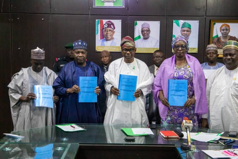 Displaying the signed MoU agreement: Left to Right: Dr. Habu Dahiru, Commissioner of Health Gombe State, The Executive Governor, Gombe State, Alhaji Mohammed Inuwa Yahaya CON, Dr. Iziaq Adekunle Salako Honourable Minister of State for Health & Social Welfare, Daju Kachollom mni, Permanent Secretary Federal Ministry of Health & Social Welfare and, Dr. Salaudeen Jimoh mni, Director Hospital Services Department FMoHSW