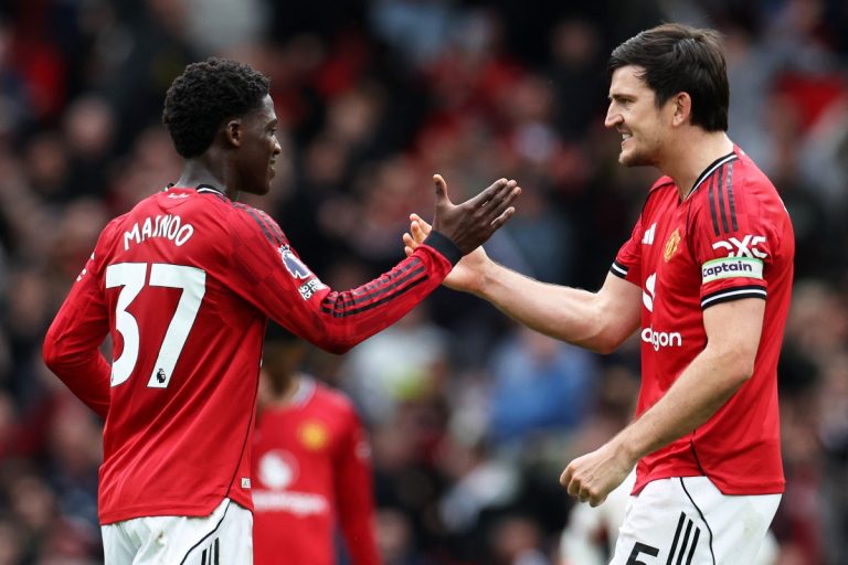 Man Utd beat Liverpool to secure Champions League place